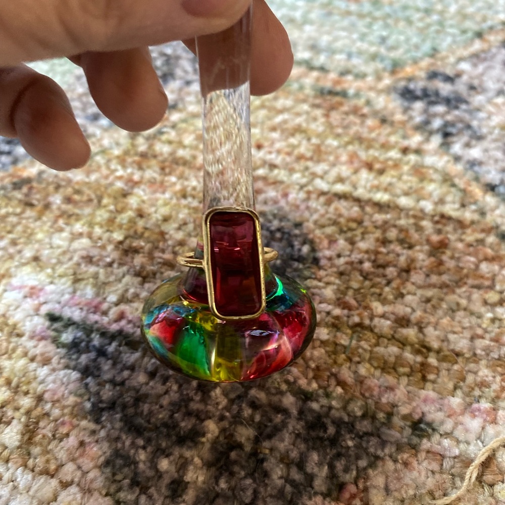 Red rectangular ring.